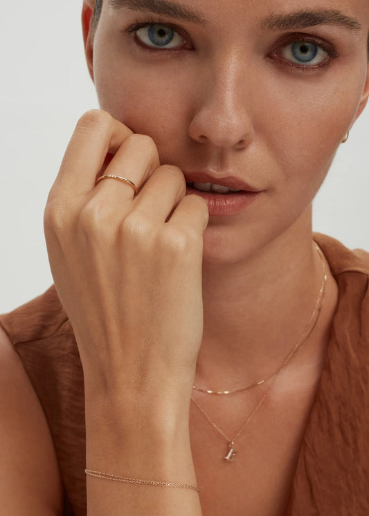 0.018 TCW Round Moissanite Three Diamond Wedding Band