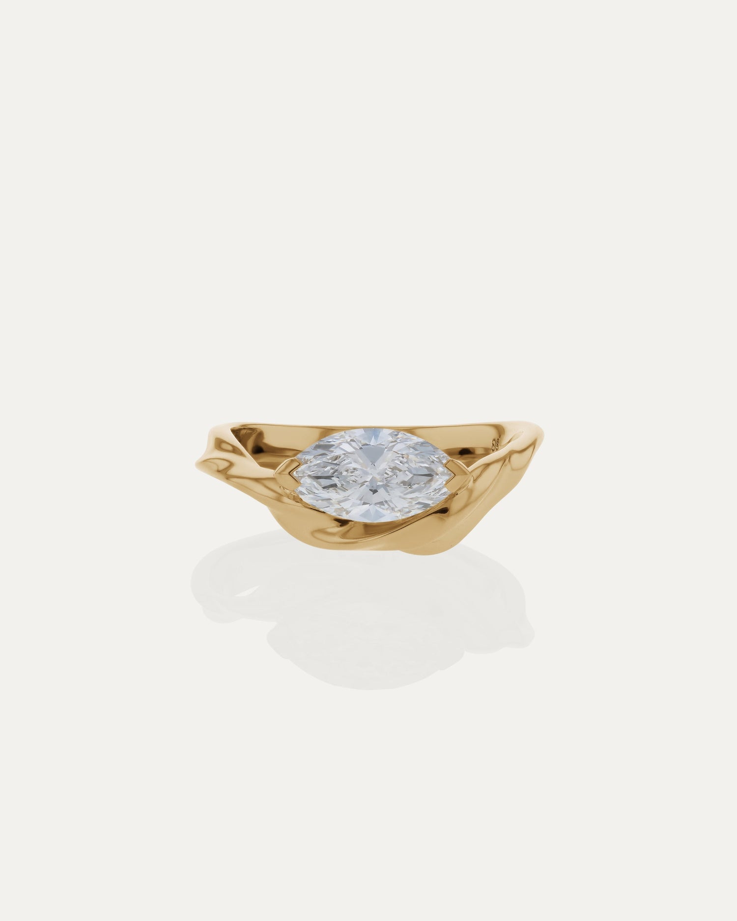 gold marquise engagement ring