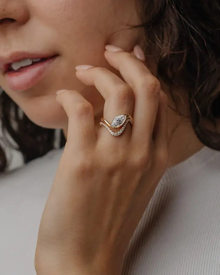 gold marquise engagement ring