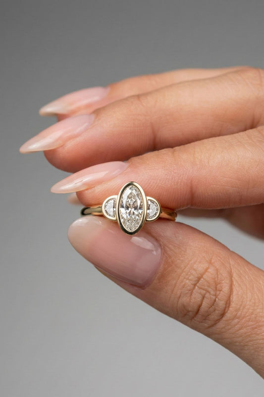 Oval Cut Bezel Three Stone Moissanite Engagement Ring