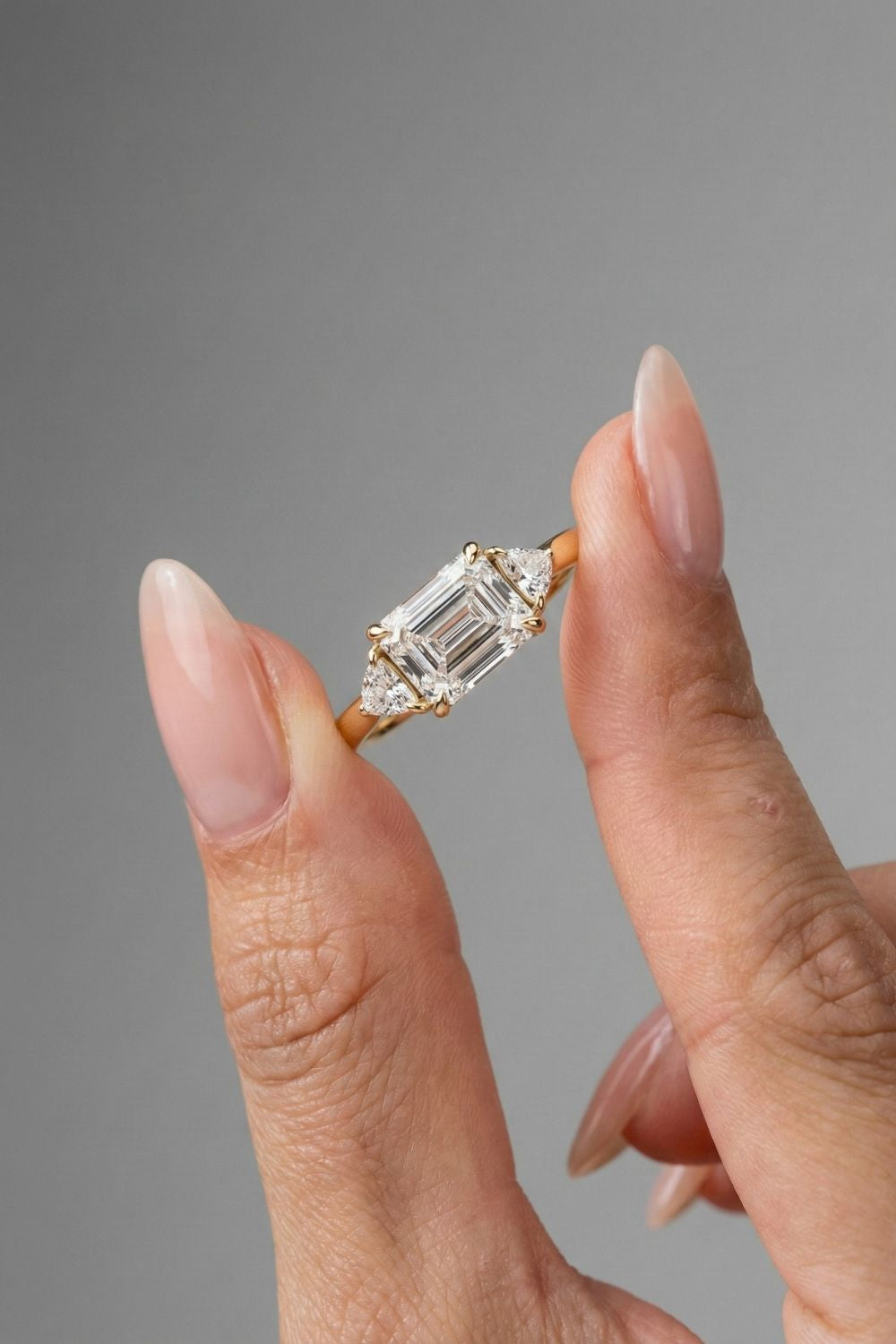 Emerald Cut Three Stone Moissanite Engagement Ring