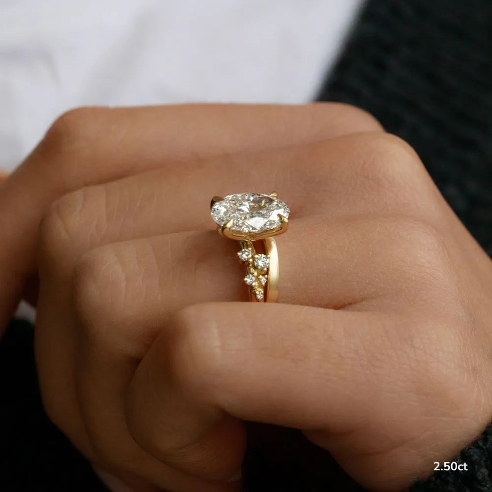 1.3 CT - 2.5 CT Oval Cut Cluster With Chevron Style Band Moissanite Engagement Ring