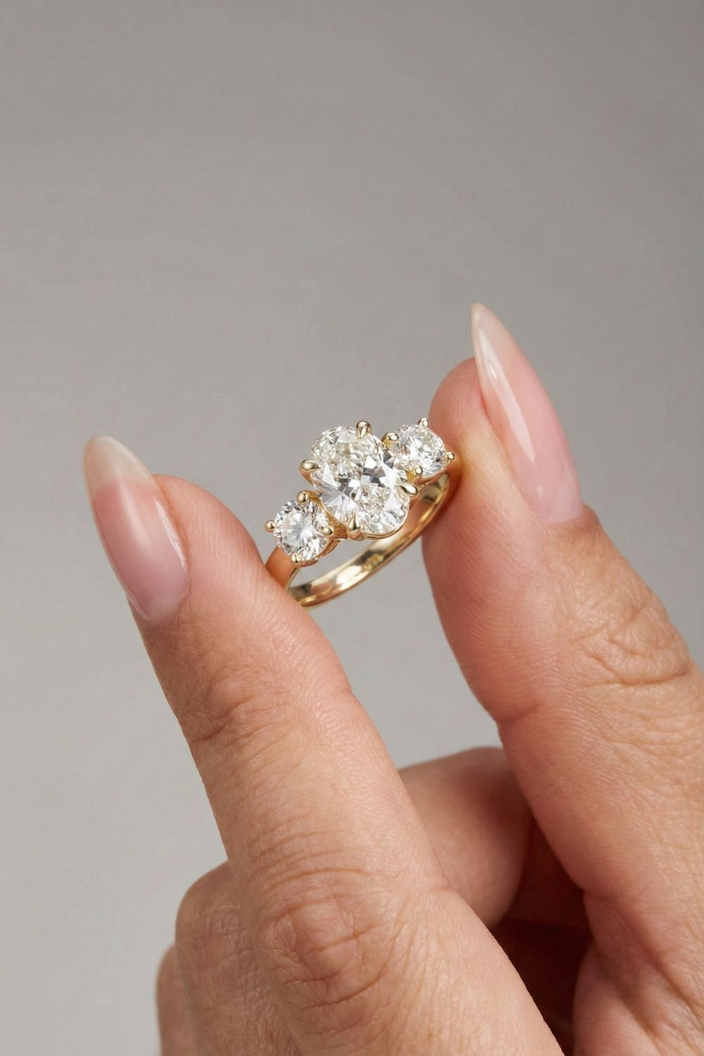 Oval Cut Lab grown Diamond Three Stone Engagement Ring