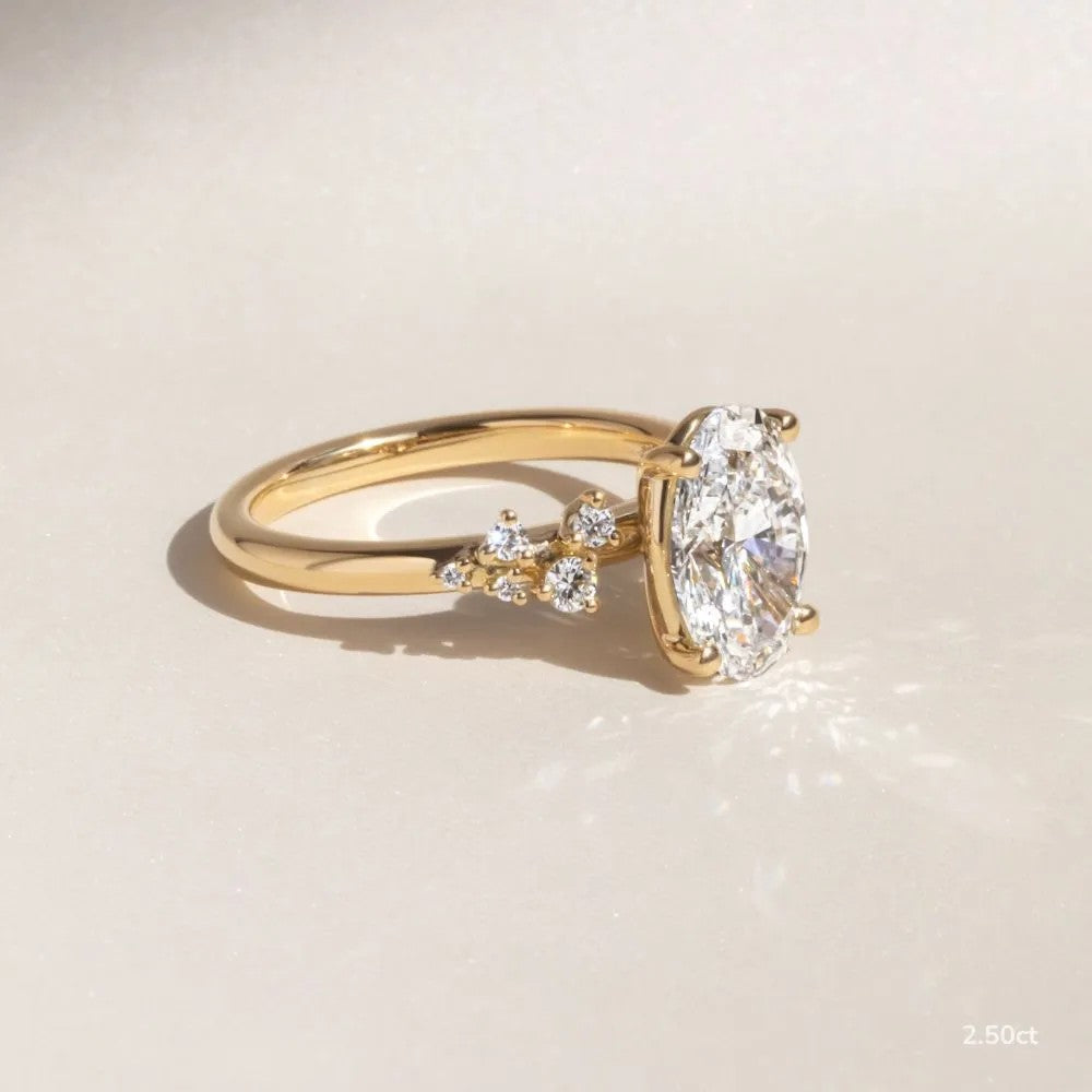 1.3 CT - 2.5 CT Oval Cut Cluster With Chevron Style Band Moissanite Engagement Ring