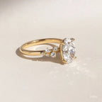 1.3 CT - 2.5 CT Oval Cut Cluster With Chevron Style Band Moissanite Engagement Ring