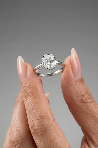 Oval Cut Solitaire Bezel Moissanite Engagement Ring