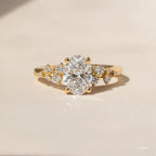 1.3 CT - 2.5 CT Oval Cut Cluster With Chevron Style Band Moissanite Engagement Ring