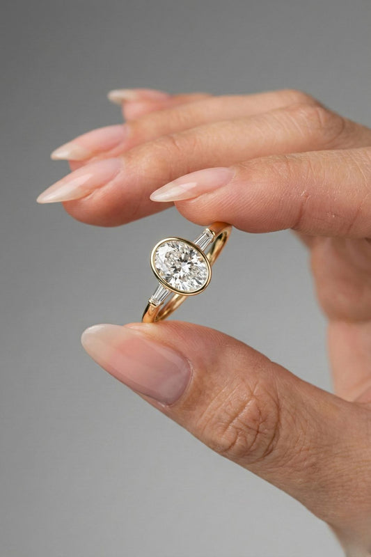 Oval Cut Three Stone Bezel Set Moissanite Engagement Ring