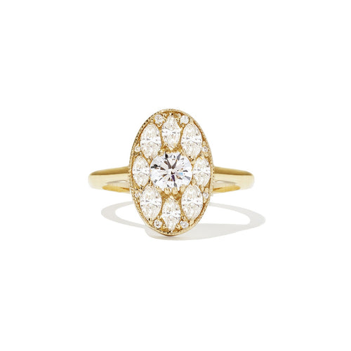 Gold ring with a diamond on a white background