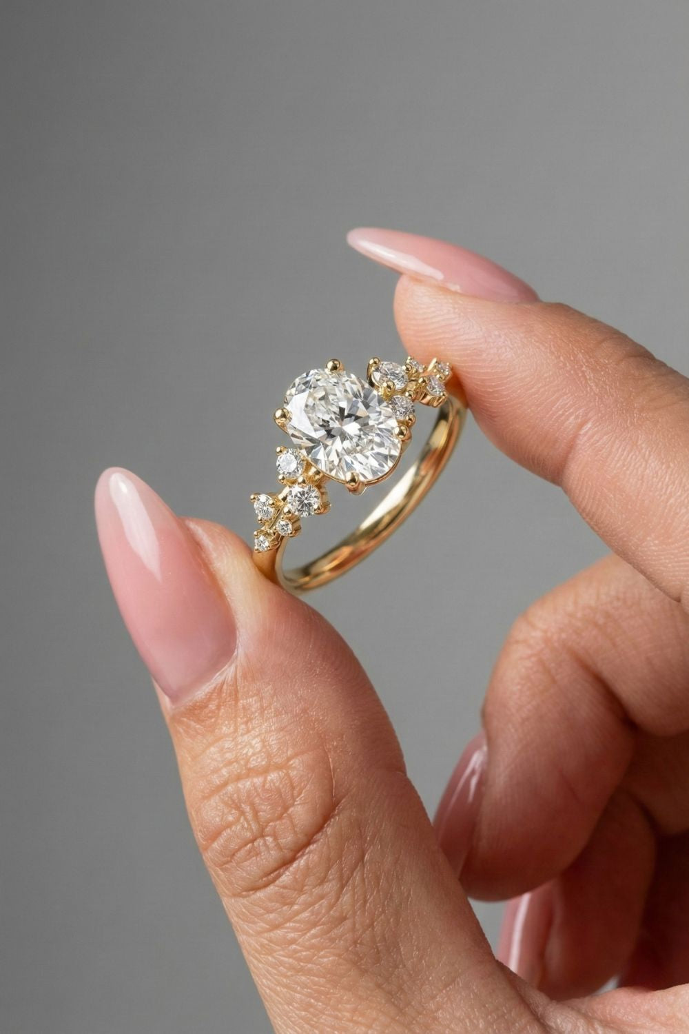 Oval Cut Cluster With Chevron Style Band Moissanite Engagement Ring