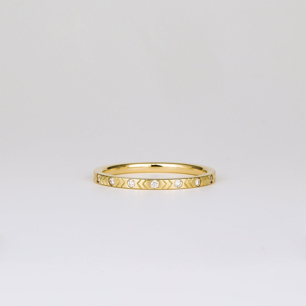 0.16 TCW Round CVD Diamond Chevron Patterned Flush Set Wedding Band