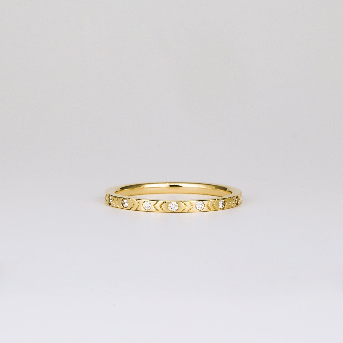 0.16 TCW Round CVD Diamond Chevron Patterned Flush Set Wedding Band