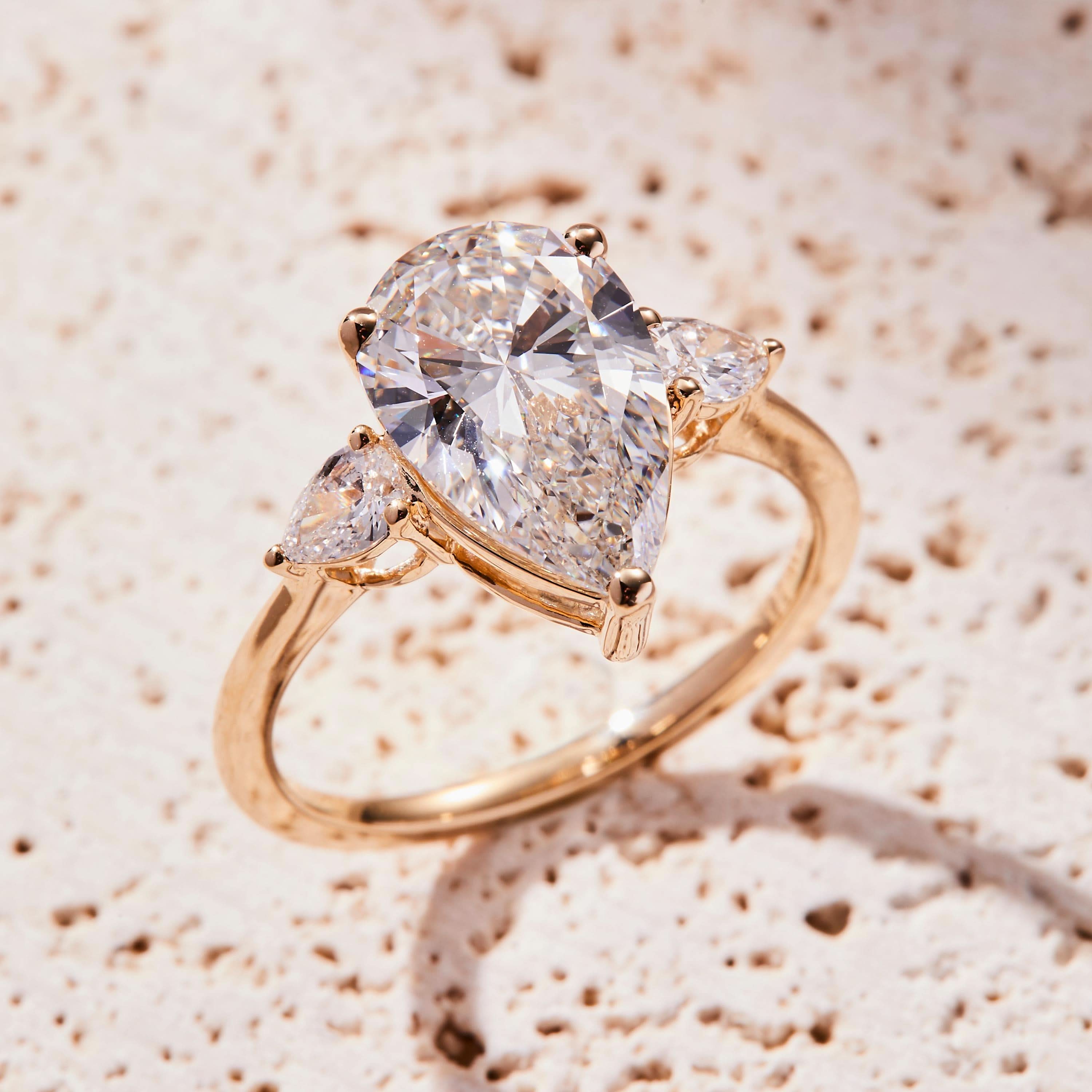 2.5 CT Pear Cut Three Stone Moissanite Engagement Ring