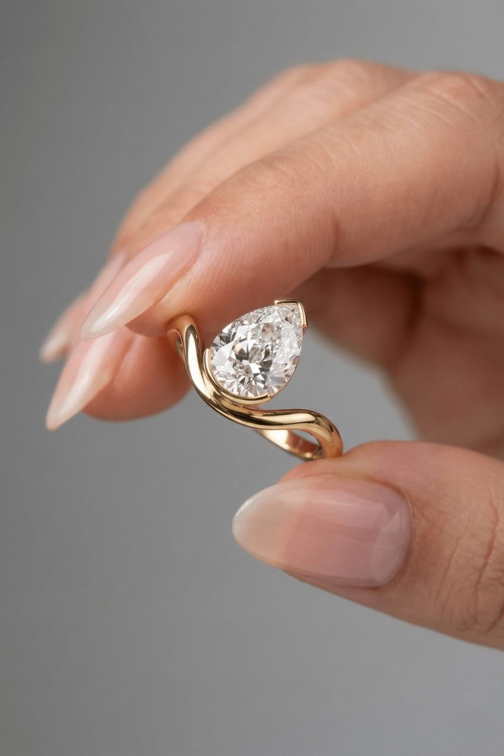 Pear Cut Half Bezel Floating Solitaire Moissanite Engagement Ring