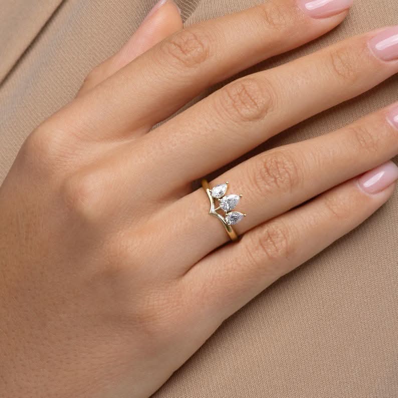 0.8 TCW Pear Cut Three Stone Crown Style Moissanite Engagement Ring