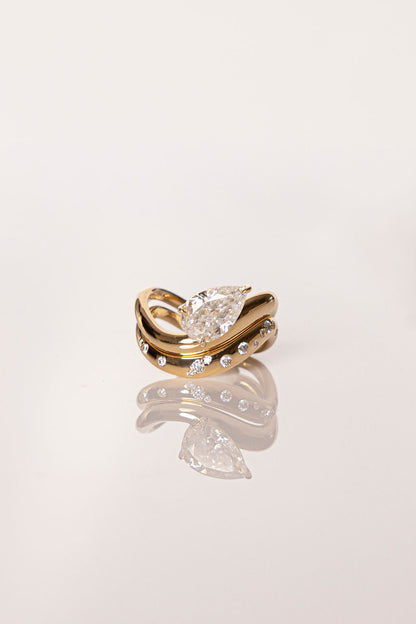 1 CT - 2 CT Pear Cut Waved Solitaire Moissanite Engagement Ring