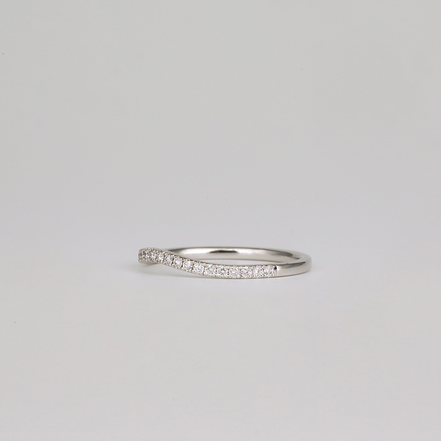 0.21 TCW Round CVD Diamond Curved Pave Wedding Band