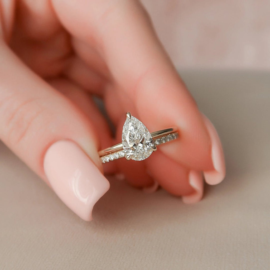 1.5 CT Pear Cut Hidden Halo Moissanite Solitaire Bridal Set