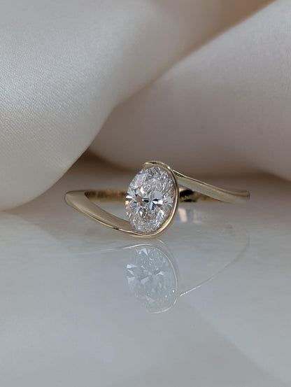 0.7 CT Oval Cut Half Bezel Unique Solitaire Moissanite Engagement Ring