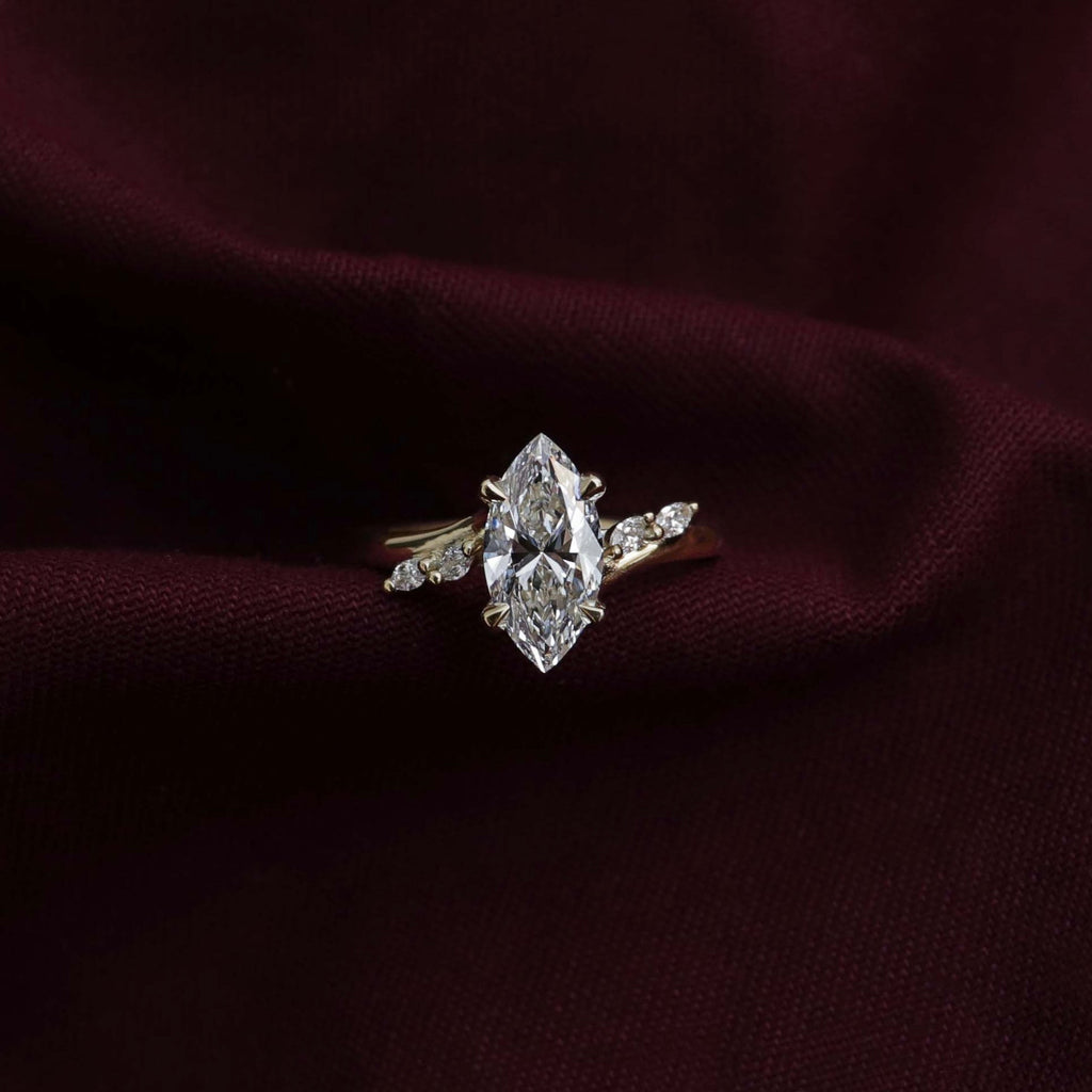 1 CT - 2 CT Marquise Cut Twisted Five Stone Moissanite Engagement Ring