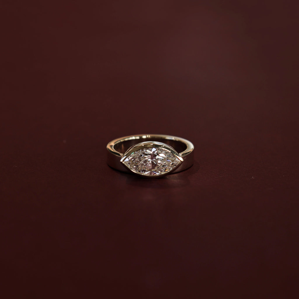 1.5 CT - 2.5 CT East-West Marquise Cut Bezel Solitaire Moissanite Engagement Ring