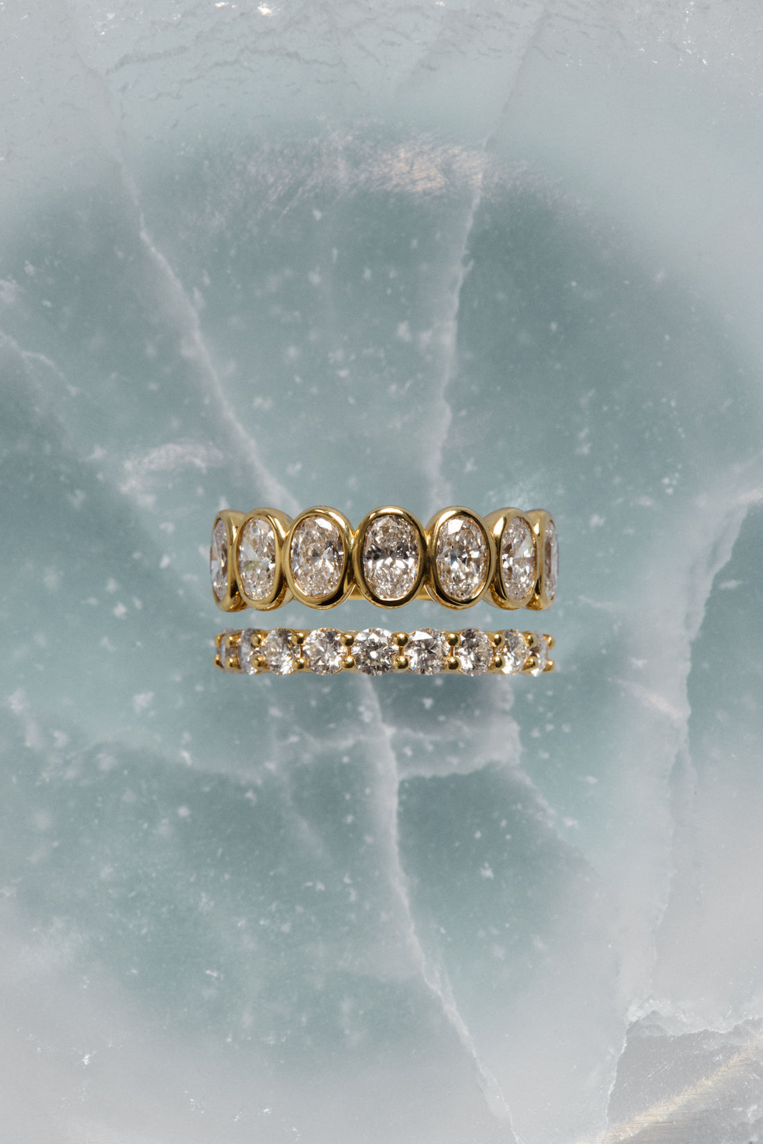 1.1 TCW Oval Moissanite Bezel Set Half Eternity Wedding Band