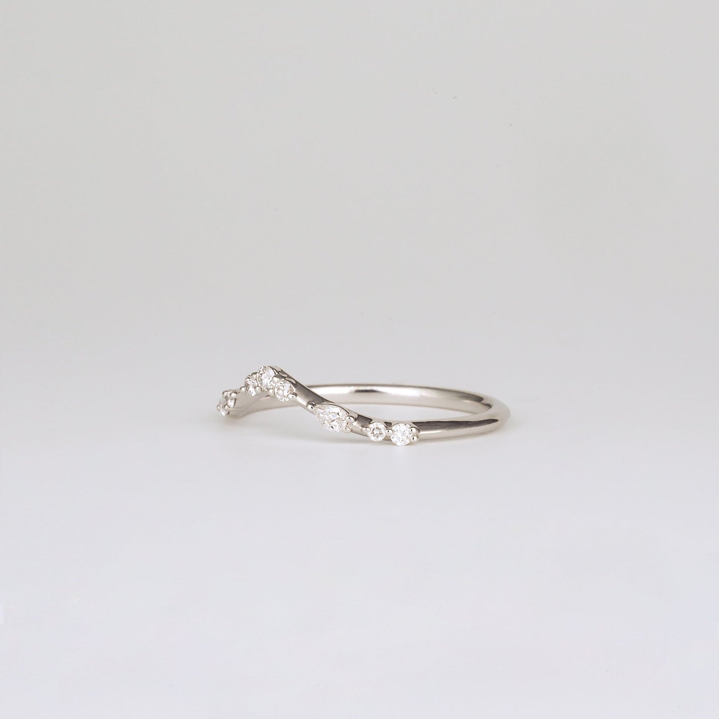 0.12 TCW Round & Pear CVD Diamond Curved Scattered Wedding Band