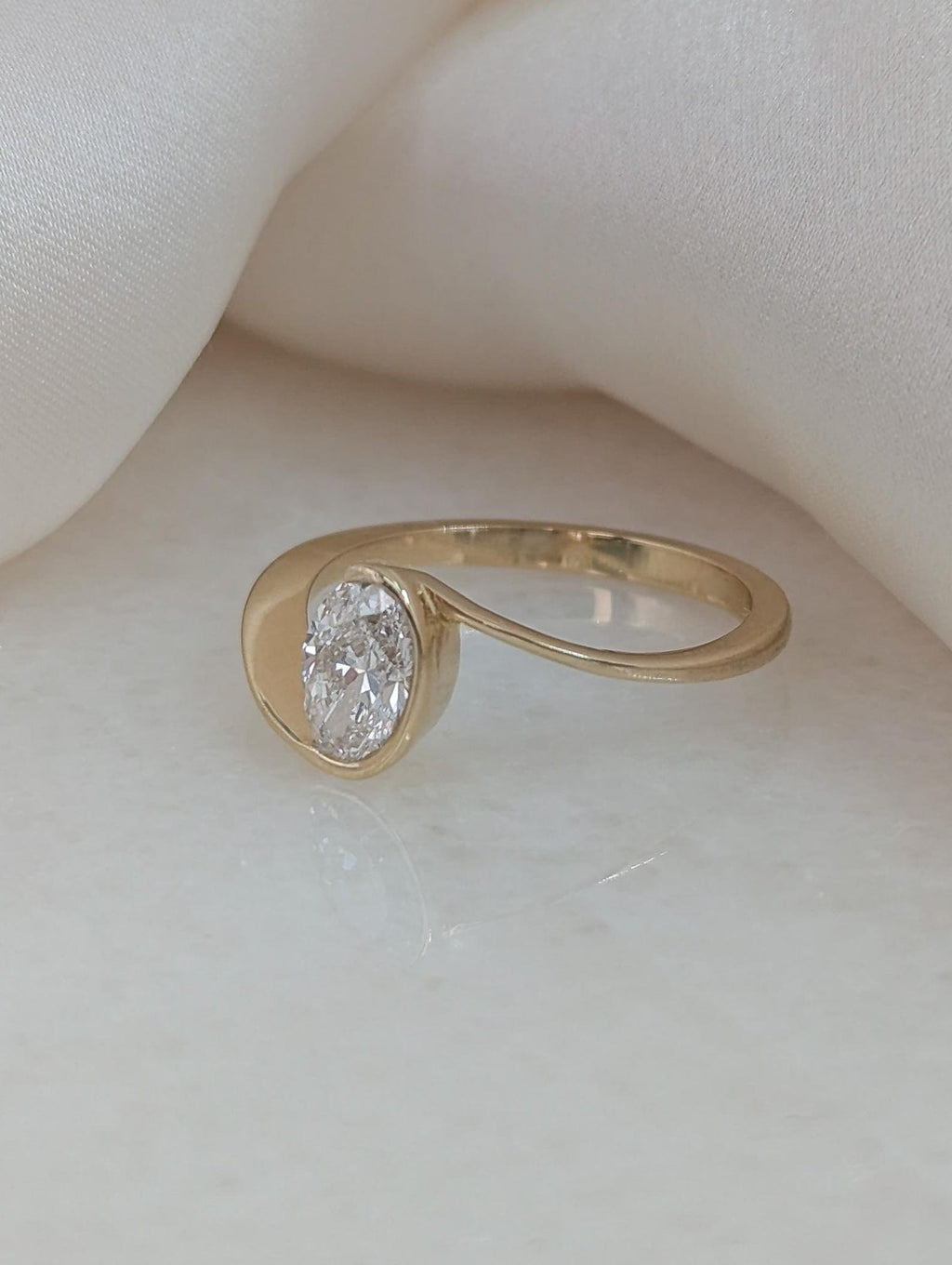 0.7 CT Oval Cut Half Bezel Unique Solitaire Moissanite Engagement Ring