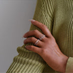 0.28 TCW Round Moissanite Criss Cross Style Wedding Band