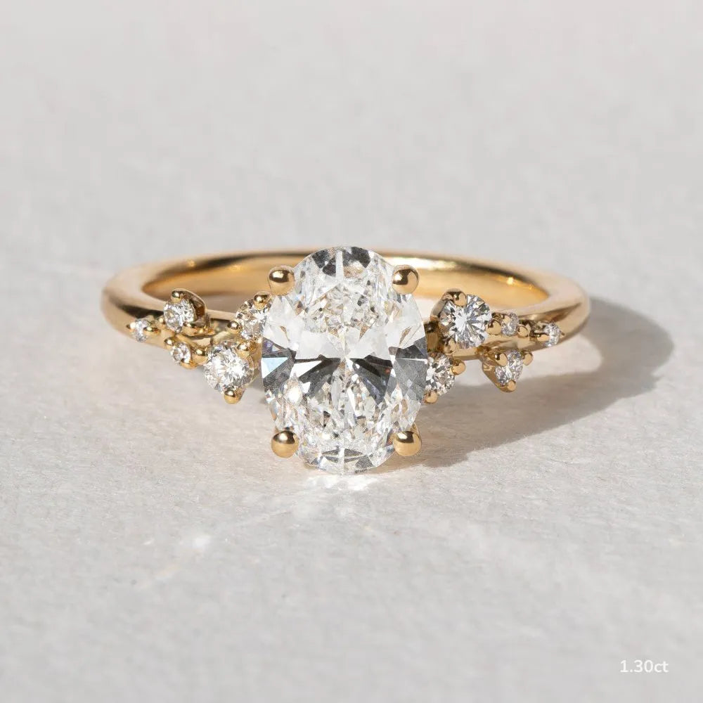 1.3 CT - 2.5 CT Oval Cut Cluster With Chevron Style Band Moissanite Engagement Ring