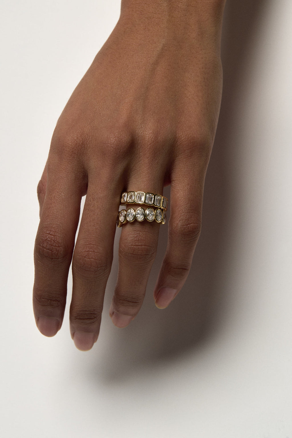 1.1 TCW Oval Moissanite Bezel Set Half Eternity Wedding Band