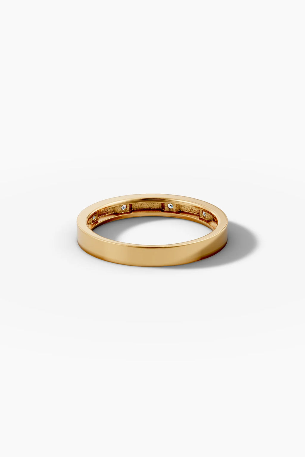 0.1 TCW Round Moissanite Flush Setting Wedding Band