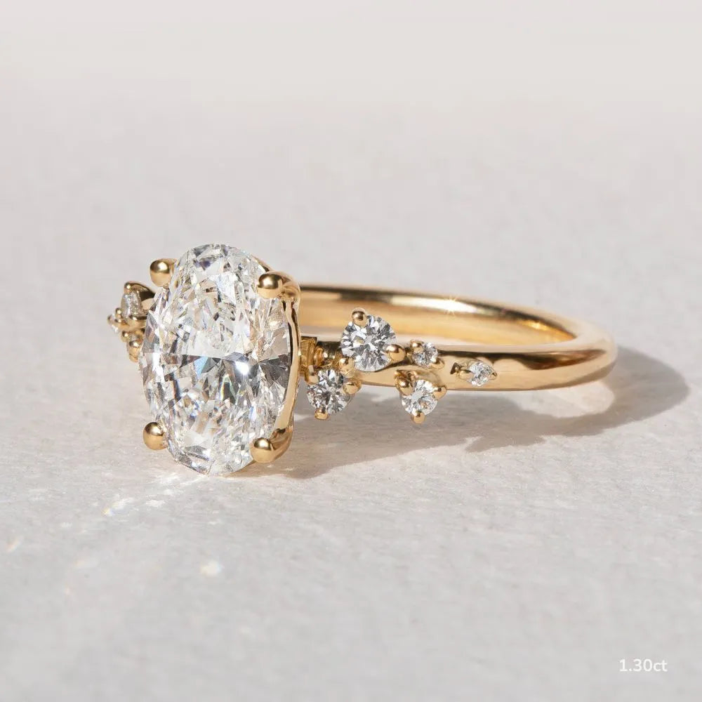 1.3 CT - 2.5 CT Oval Cut Cluster With Chevron Style Band Moissanite Engagement Ring