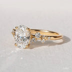 1.3 CT - 2.5 CT Oval Cut Cluster With Chevron Style Band Moissanite Engagement Ring