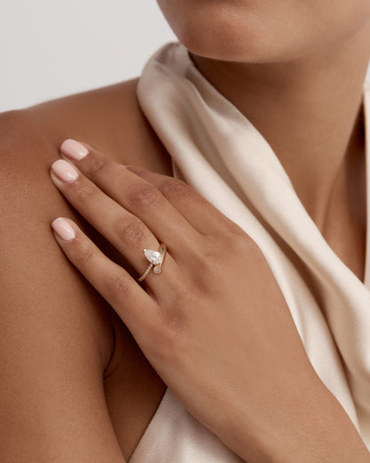 1 CT Pear Cut Lab grown Diamond Bypass Side Stone & Half Pave Engagement Ring