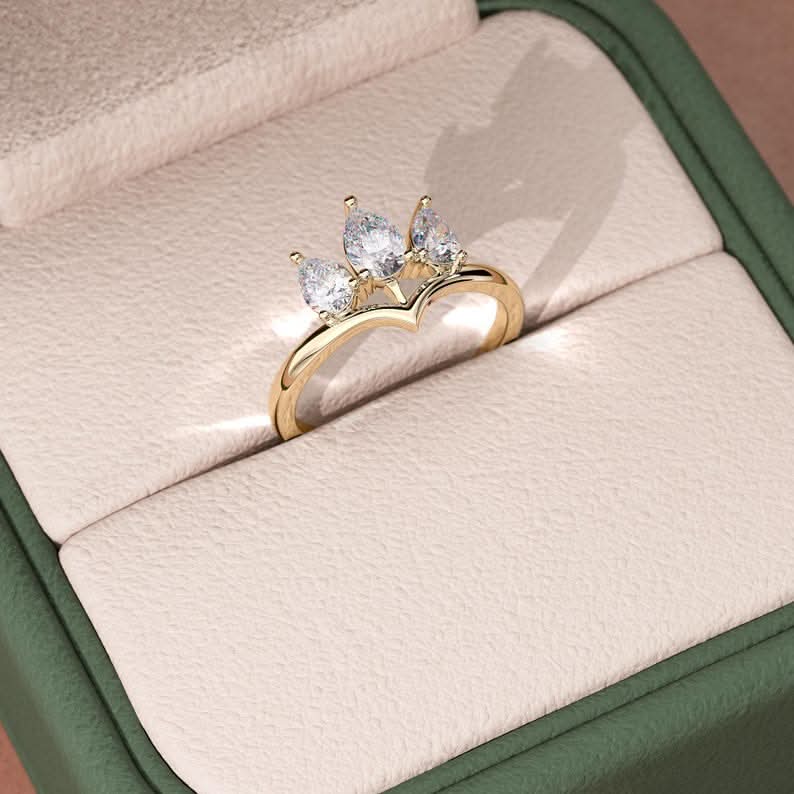 0.8 TCW Pear Cut Three Stone Crown Style Moissanite Engagement Ring