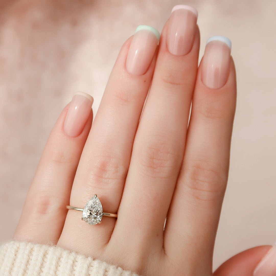 1.5 CT Pear Cut Hidden Halo Moissanite Solitaire Bridal Set