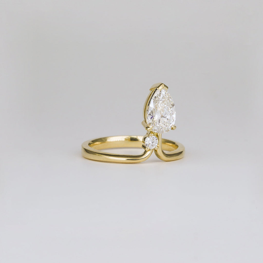 1.06 CT - 3.06 CT Pear Cut Lab grown Diamond Side Stone Unique Engagement Ring