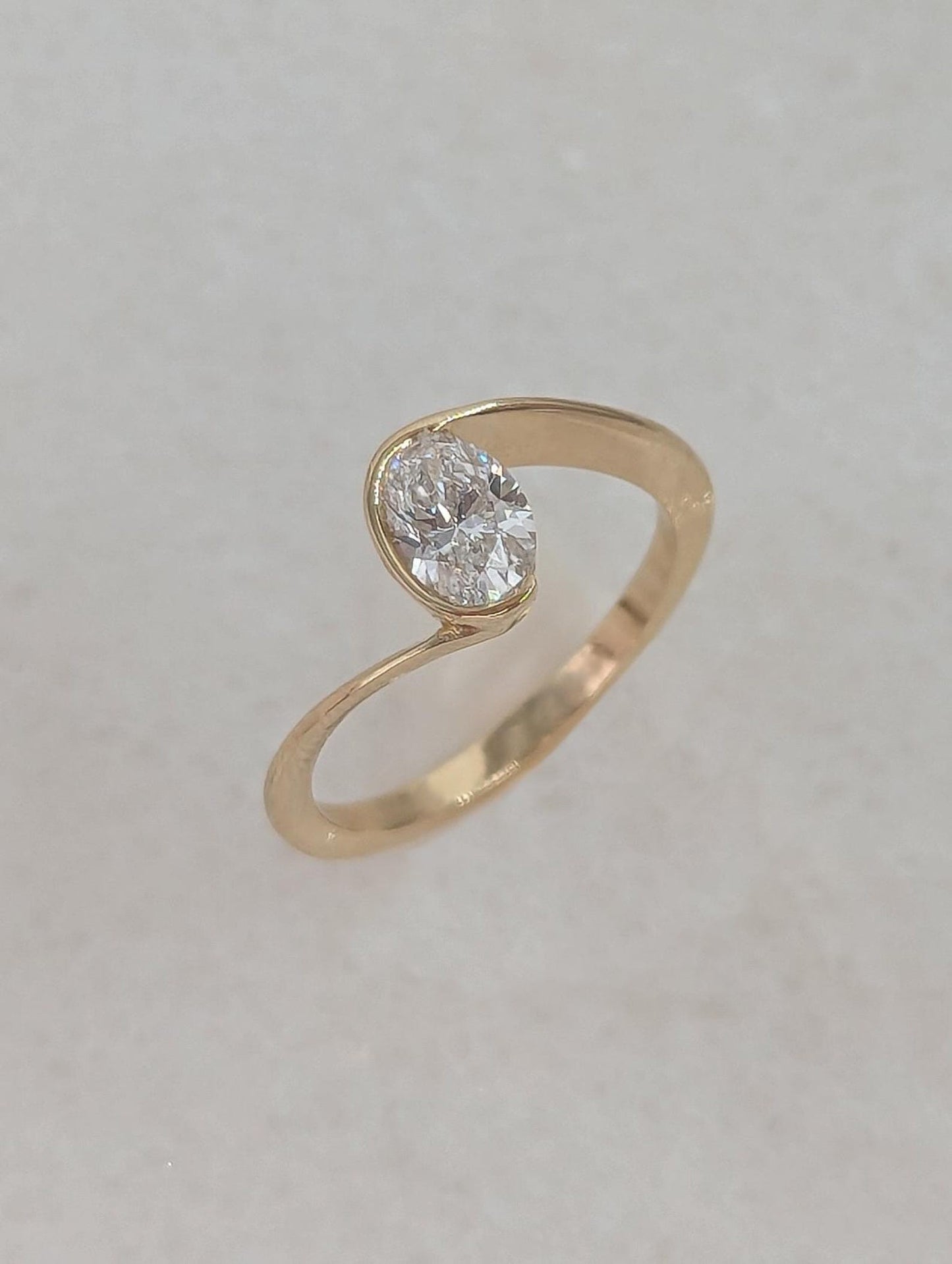 0.7 CT Oval Cut Half Bezel Unique Solitaire Moissanite Engagement Ring