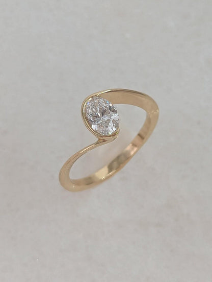 0.7 CT Oval Cut Half Bezel Unique Solitaire Moissanite Engagement Ring