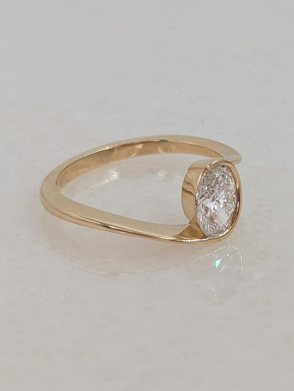 0.7 CT Oval Cut Half Bezel Unique Solitaire Moissanite Engagement Ring