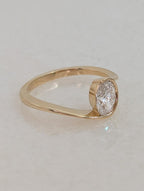 0.7 CT Oval Cut Half Bezel Unique Solitaire Moissanite Engagement Ring