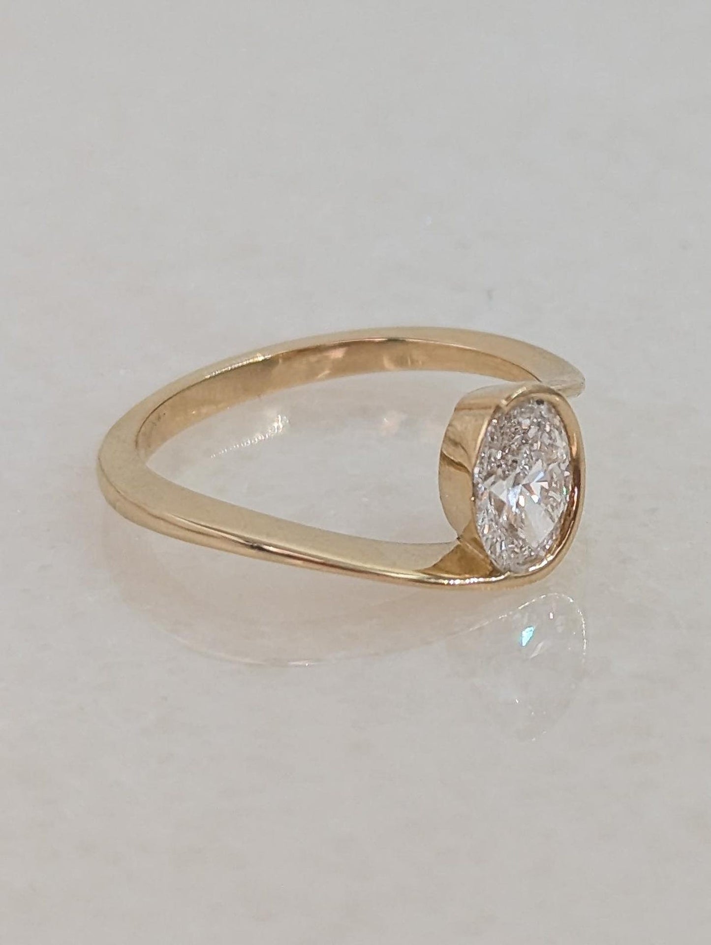 0.7 CT Oval Cut Half Bezel Unique Solitaire Moissanite Engagement Ring