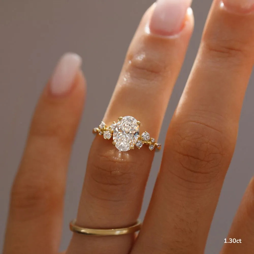 1.3 CT - 2.5 CT Oval Cut Cluster With Chevron Style Band Moissanite Engagement Ring