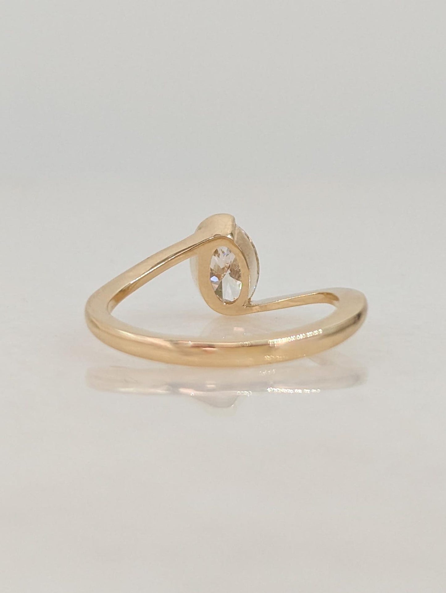 0.7 CT Oval Cut Half Bezel Unique Solitaire Moissanite Engagement Ring