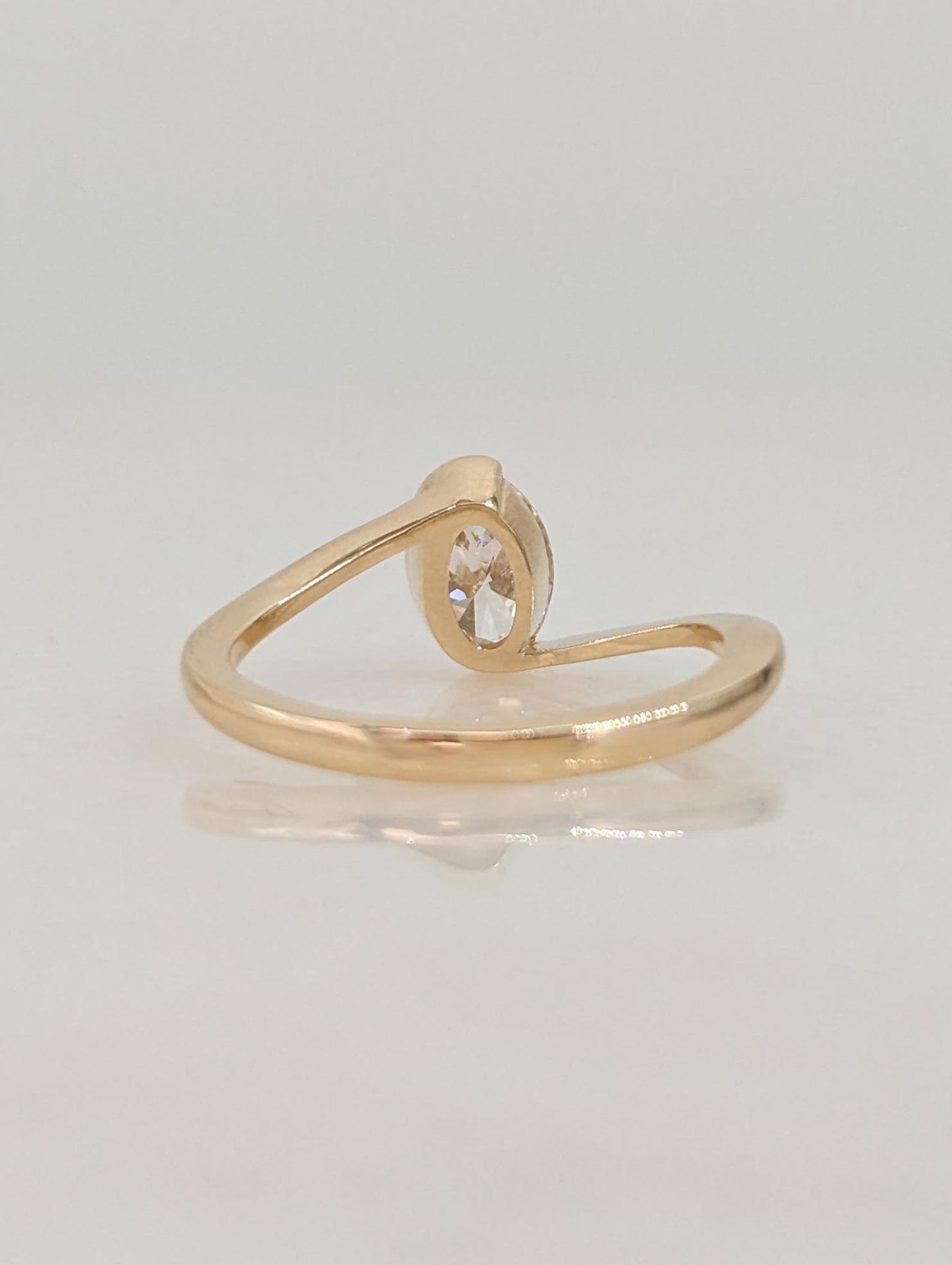 0.7 CT Oval Cut Half Bezel Unique Solitaire Moissanite Engagement Ring