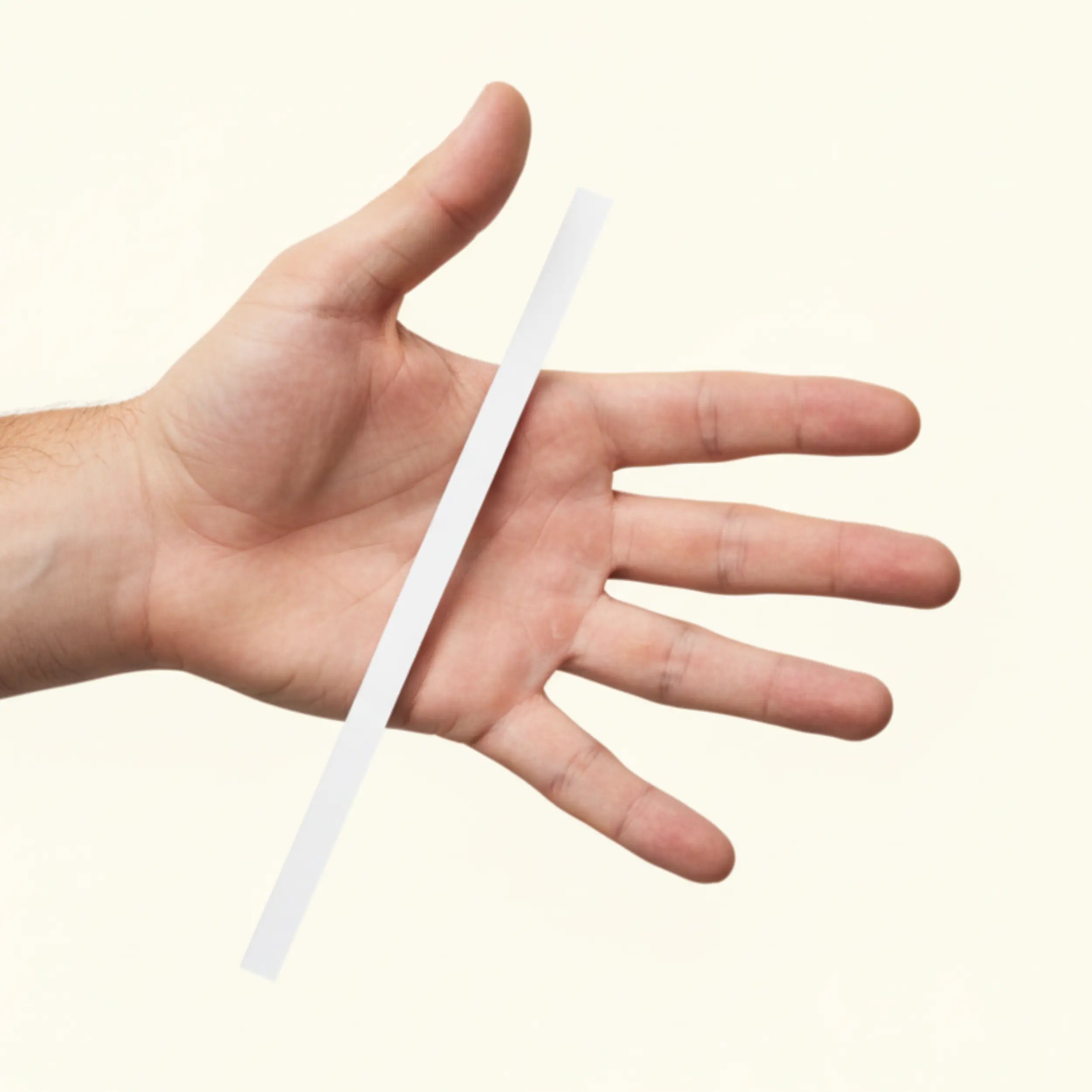 Paper strip, string, and flexible measuring tape used to measure finger size